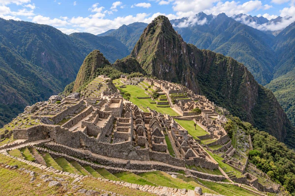 Peru and chile now shine at the world travel awards for food culture and adventure in south america - travel and tour world Machu picchu’s ancient stone ruins and green terraces with huayna picchu rising behind in peru