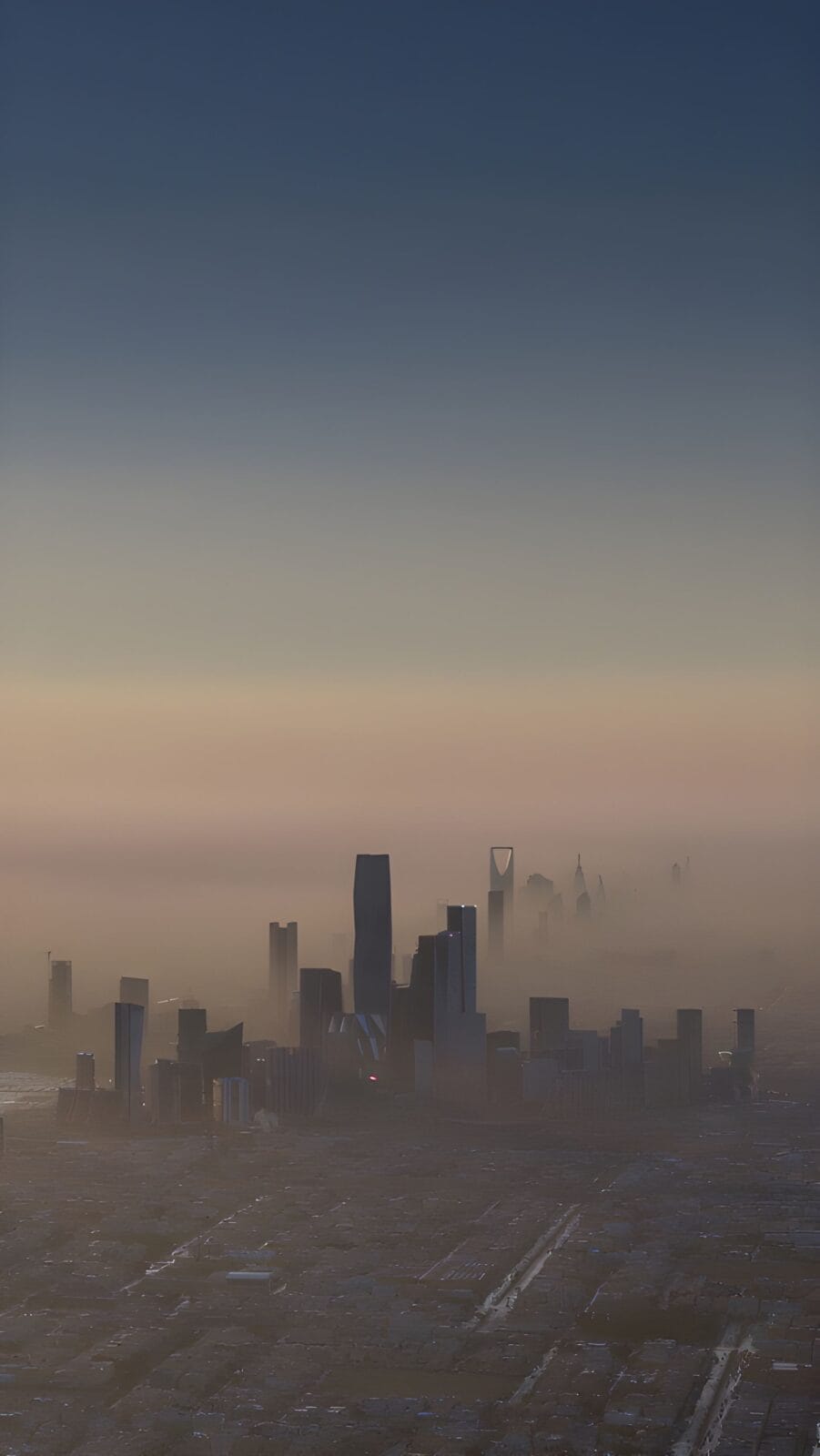 Riyadh skyline with kingdom centre and surrounding skyscrapers emerging through mist in saudi arabia.