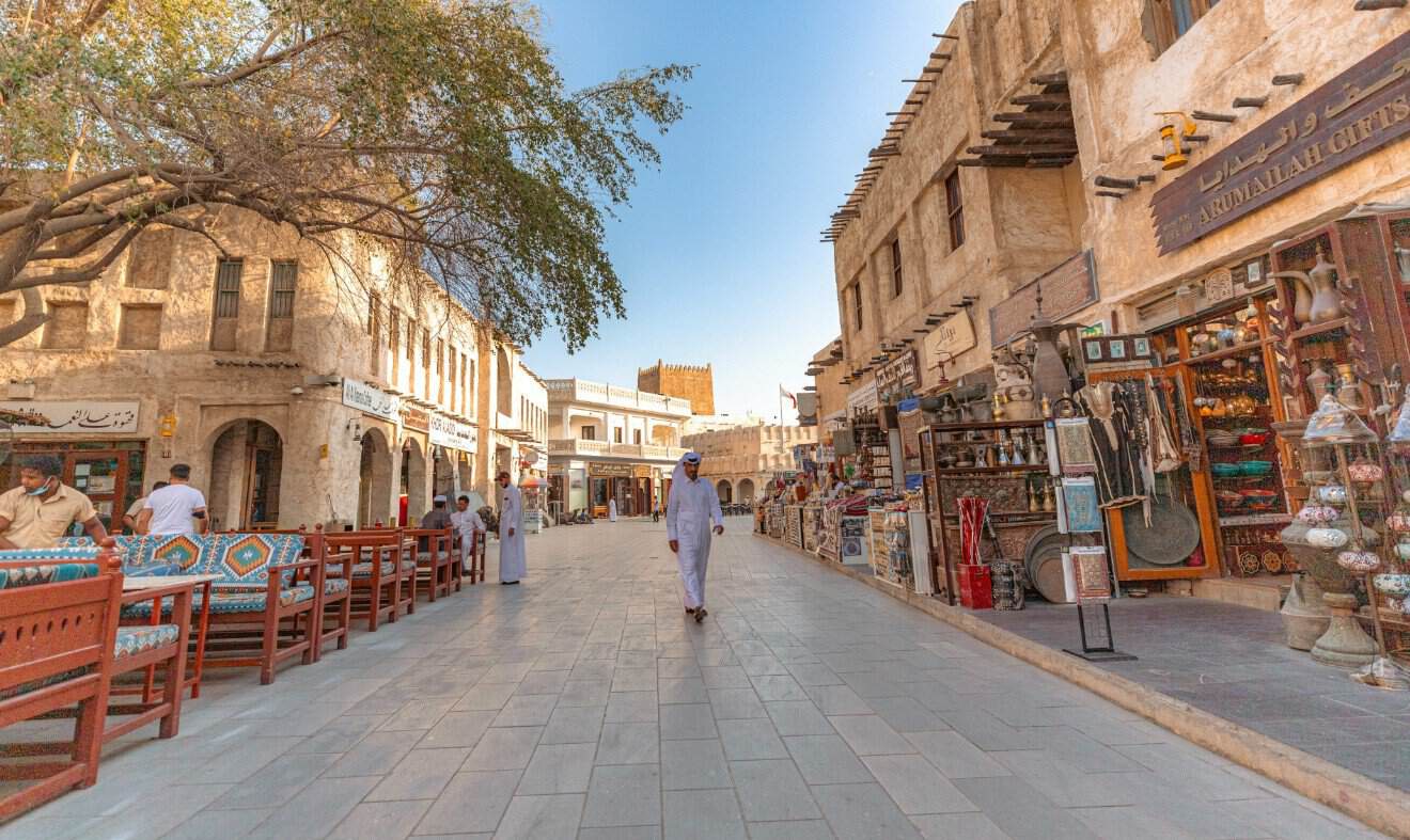 Qatar - travel and tour world Sheikh walking in the street