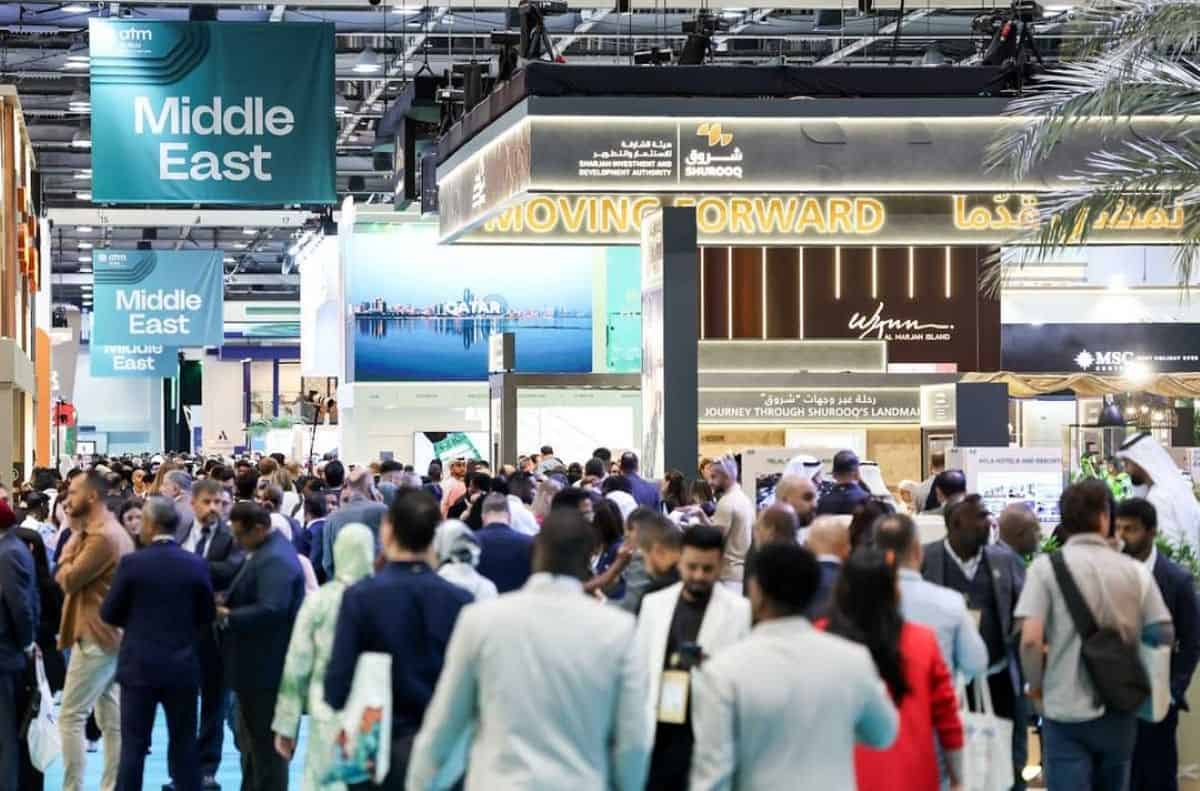 Uae is now building on arabian travel market 2026 to unlock new travel trade ties and more ways to explore - travel and tour world Crowds explore the middle east section at arabian travel market in dubai, with sharjah and qatar exhibition stands.