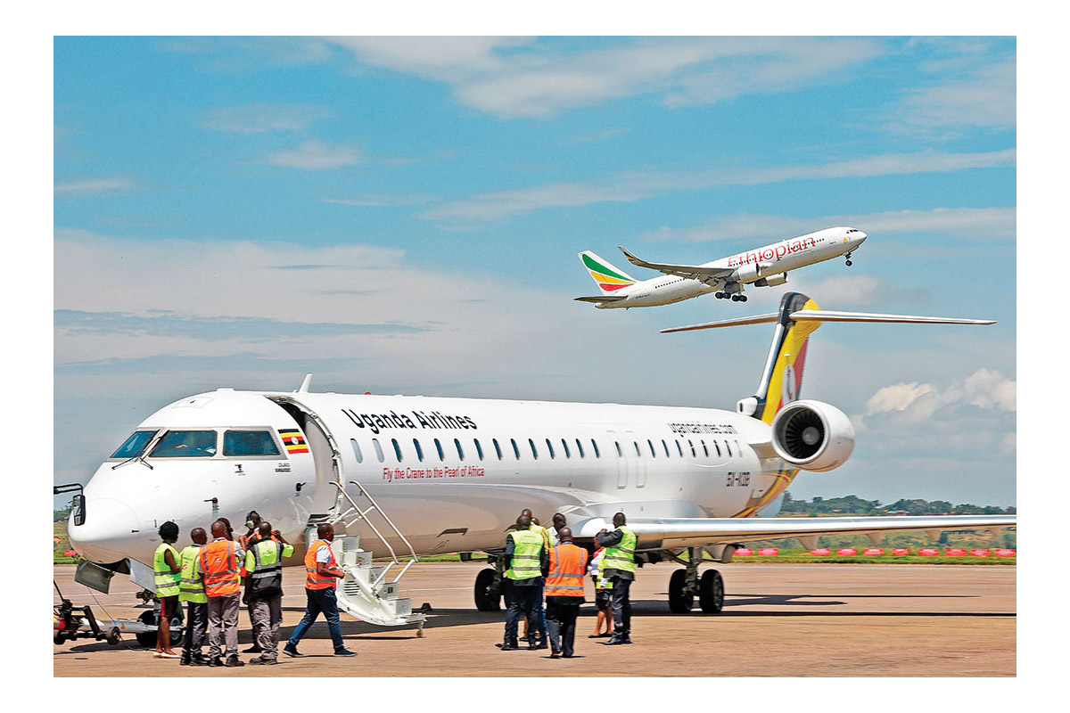 Workers working infront uganda airlines