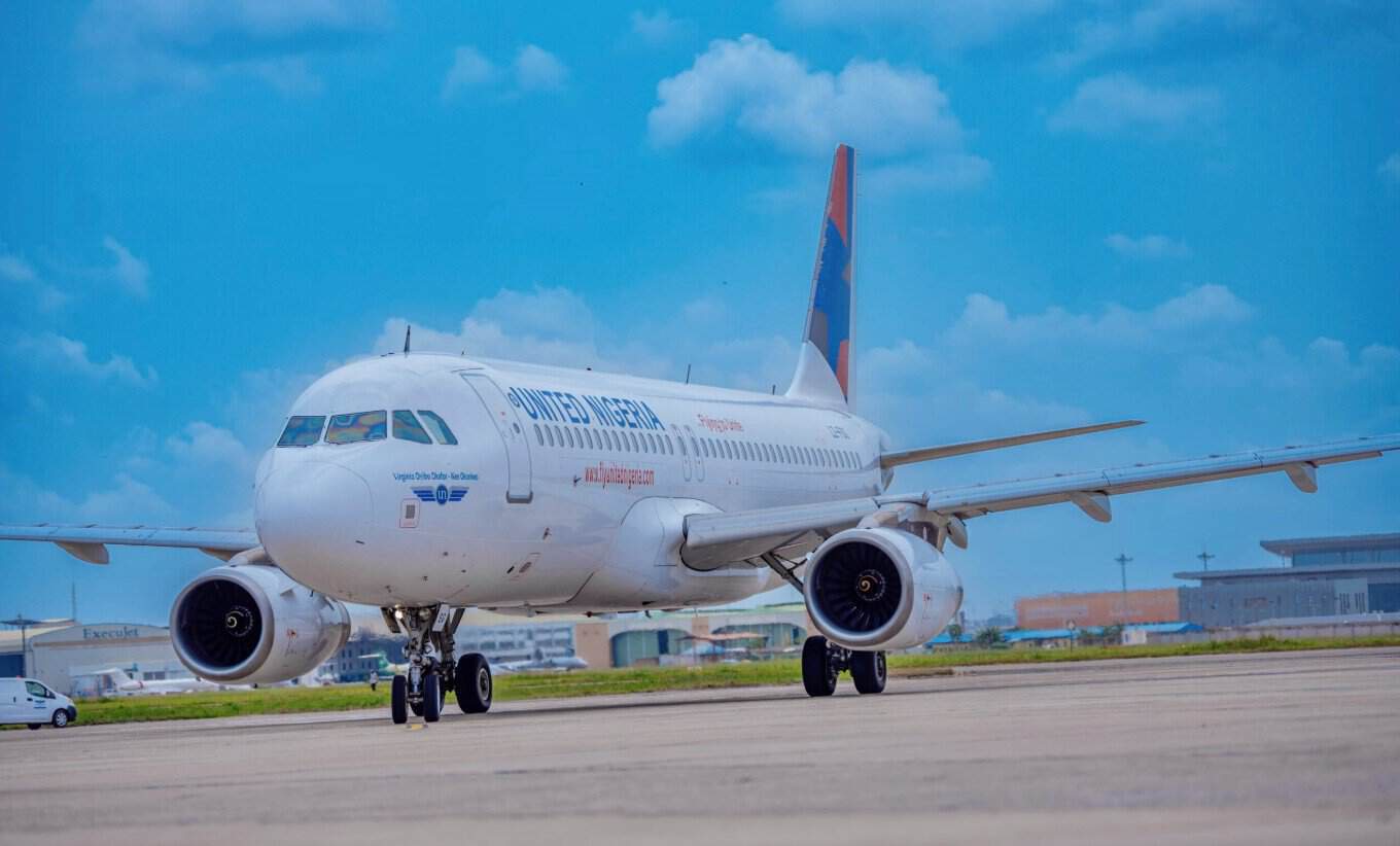 United nigeria airlines - travel and tour world Photo of a flight on the runaway