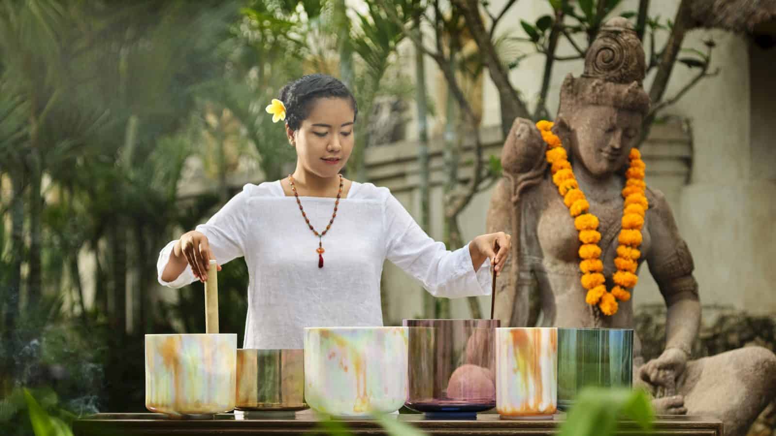 Four-seasons-bali-luxury-wellness-sound-healing-singing-bowls - travel and tour world Four seasons bali luxury wellness experience featuring crystal singing bowls, sound healing rituals and traditional balinese surroundings.