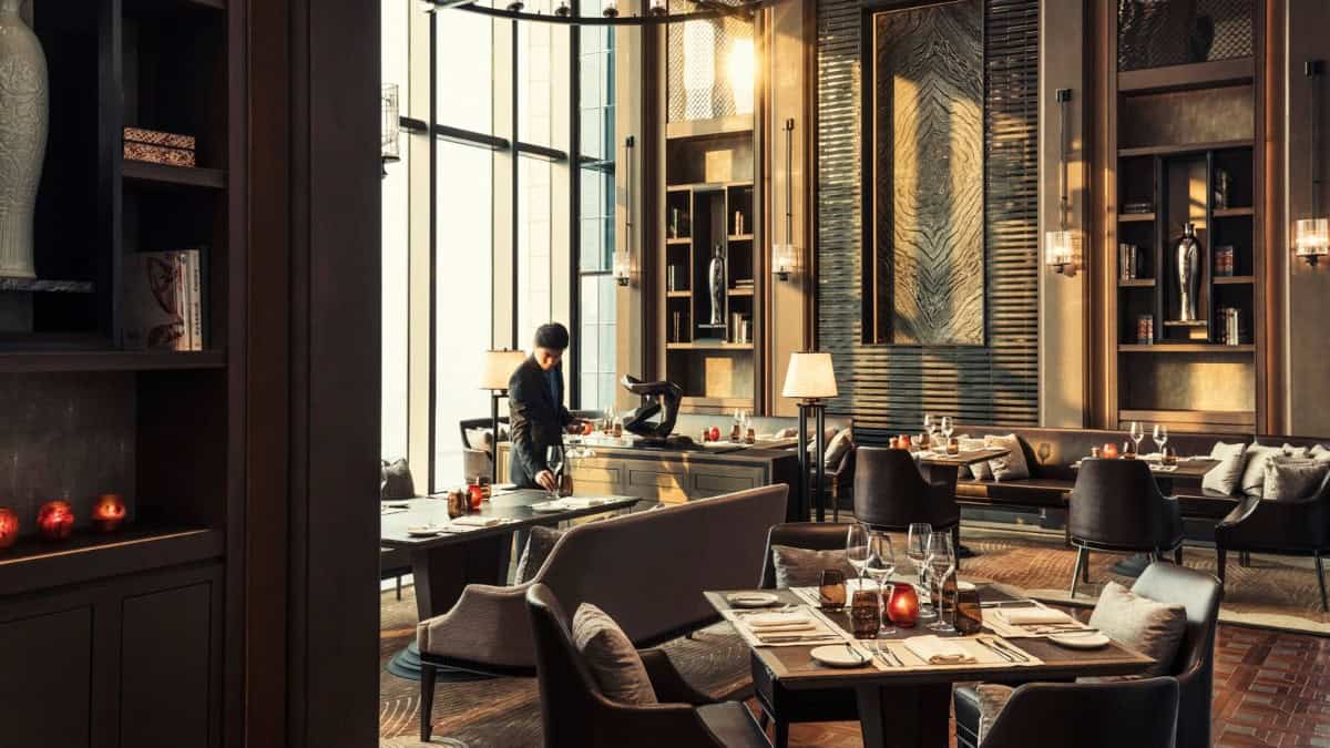 Luxury restaurant at four seasons hotel tianjin showcasing an elegant setting for seasonal autumn dining.