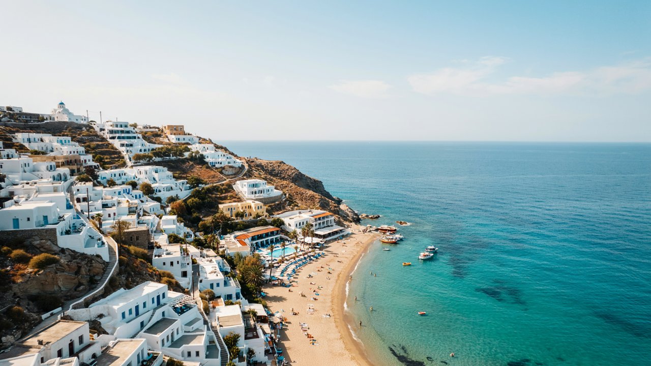 Greece-tourism-2026-greek-islands-coastal-traveljpg - travel and tour world Greece's picturesque islands showcase turquoise waters, whitewashed architecture and vibrant Mediterranean tourism.