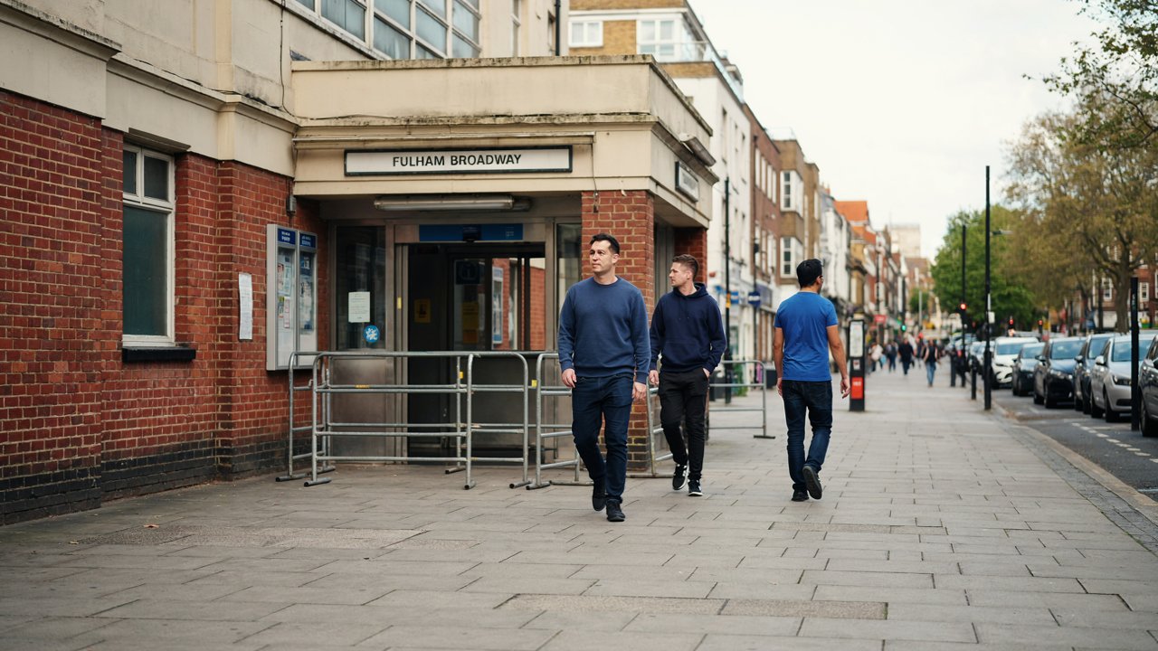 Uk travel disruption looms as chelsea and tottenham fans now must plan a better for london tube closures - travel and tour world Pedestrians walk past metal barriers outside the red-brick entrance to fulham broadway station in london