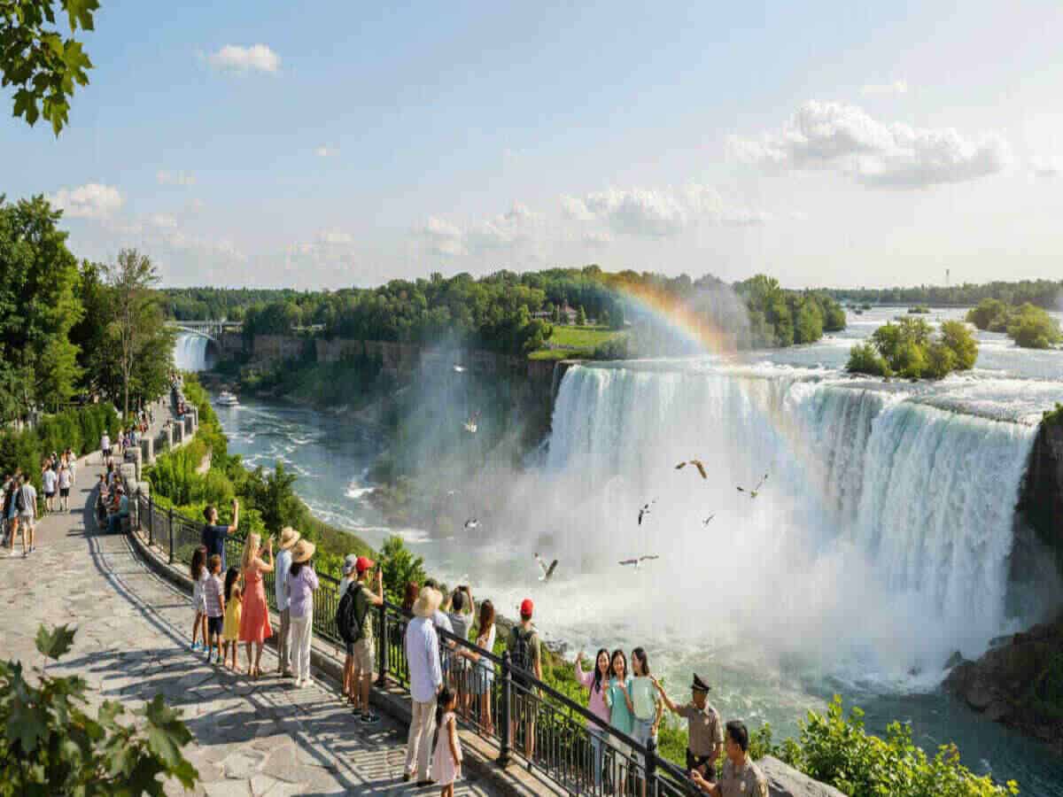 Niagara parks tourism growth 2026 - travel and tour world Tourists enjoying niagara falls during canada's 2026 tourism boom