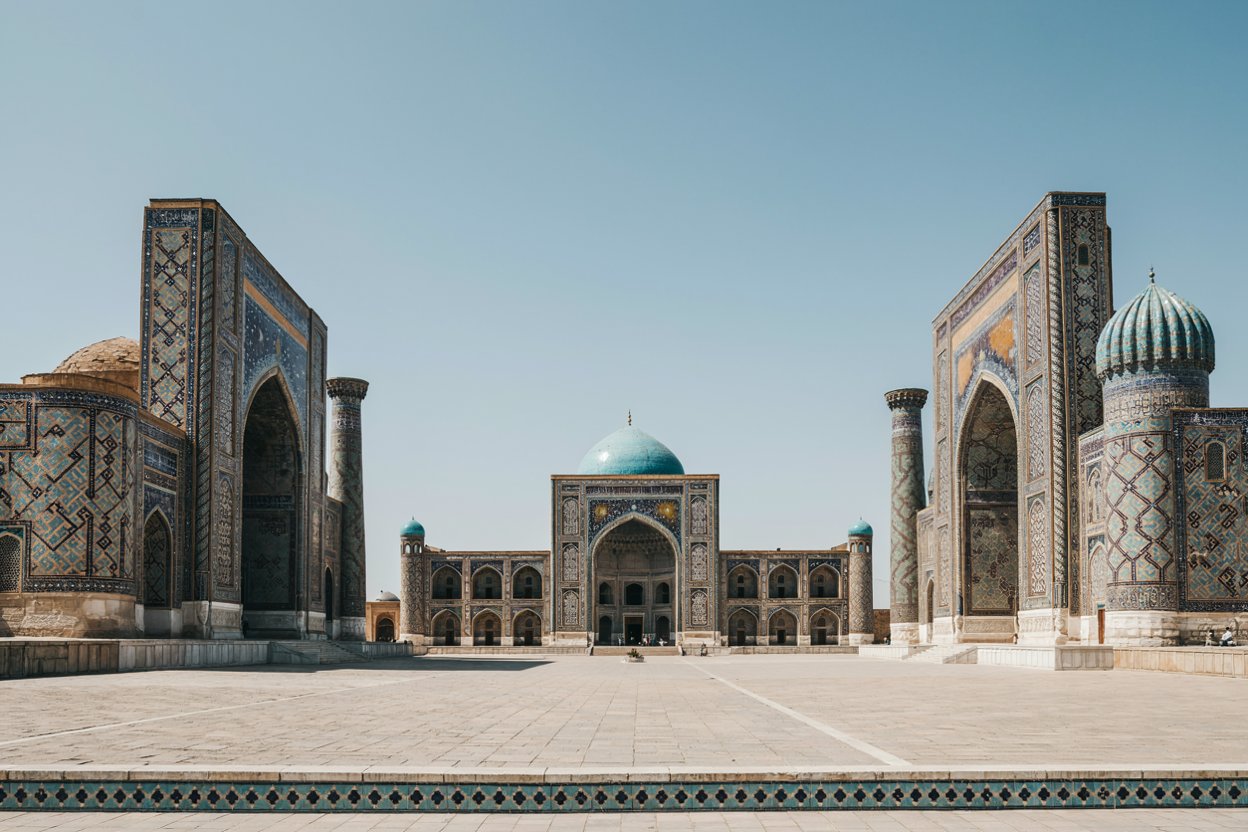 Uzbekistan tourism is on the rise as new data show 20. 4% more arrivals and 73% from three neighbours - travel and tour world Registan square in samarkand, uzbekistan, with ornate tiled madrasahs and turquoise domes beneath a clear blue sky