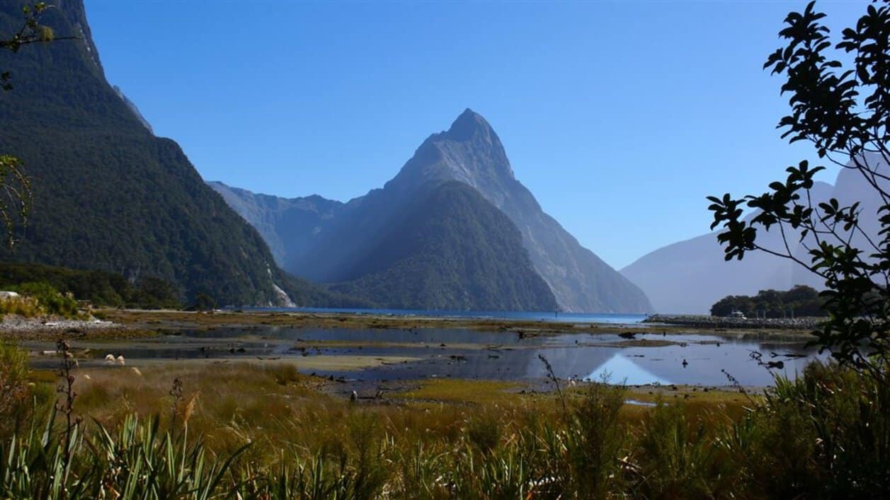 Mitre peak above milford sound, a new zealand destination for organised tours with accompanying tour escorts.