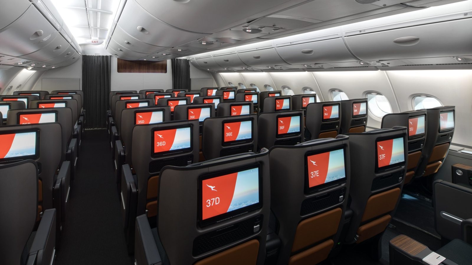 Qantas a380 passenger cabin interior featuring seatback entertainment screens as qantas group expands aviation operations in perth.