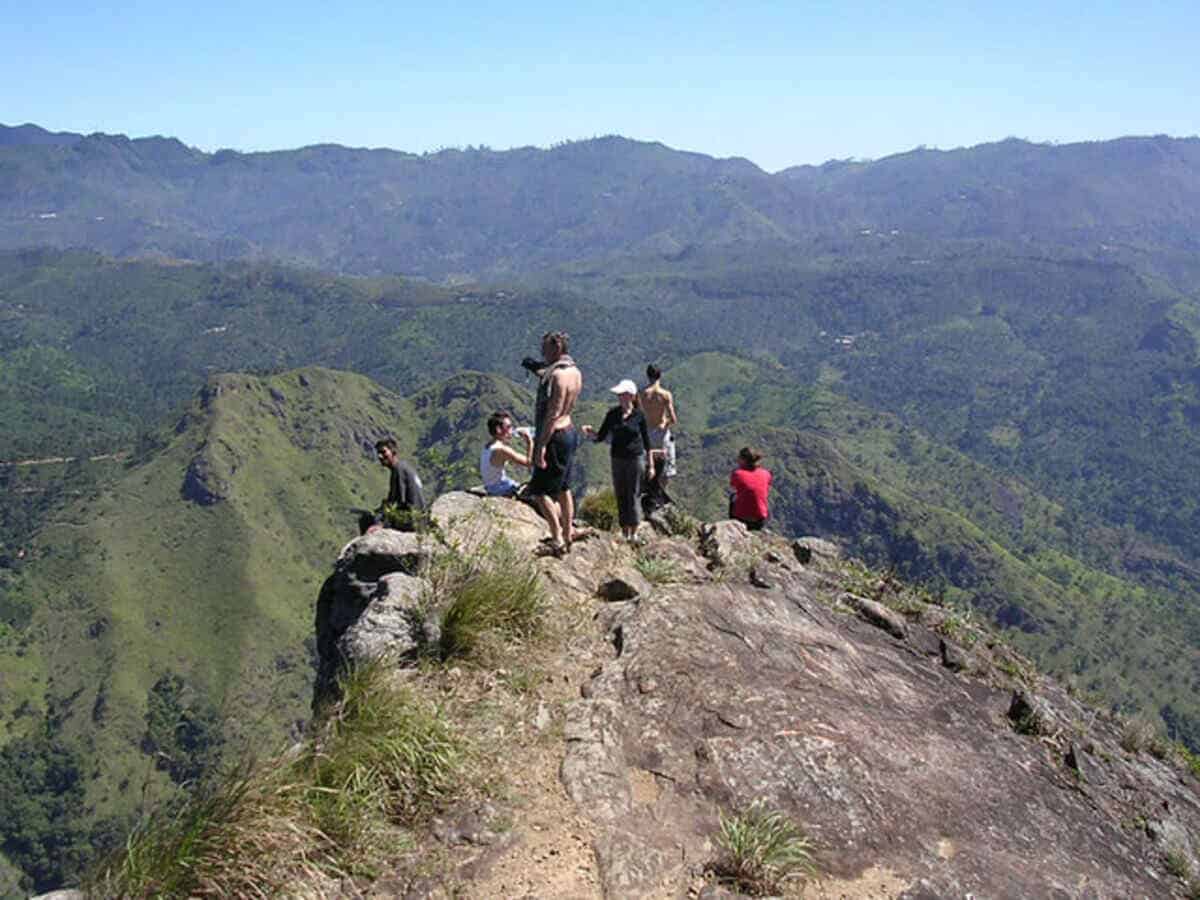 Sri lanka mountain tourism - travel and tour world Tourists hiking sri lanka's scenic mountains