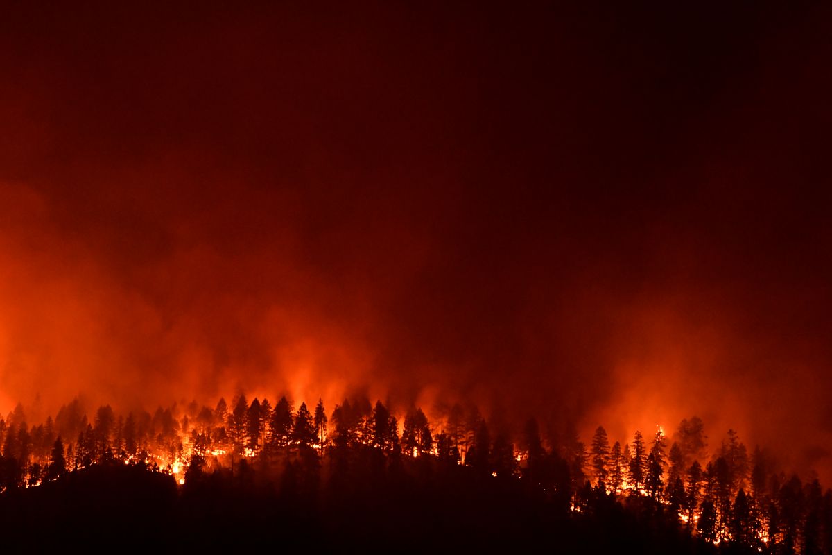 Southern california wildfires threaten homes and disrupt highway travel as firefighters tackle flames.