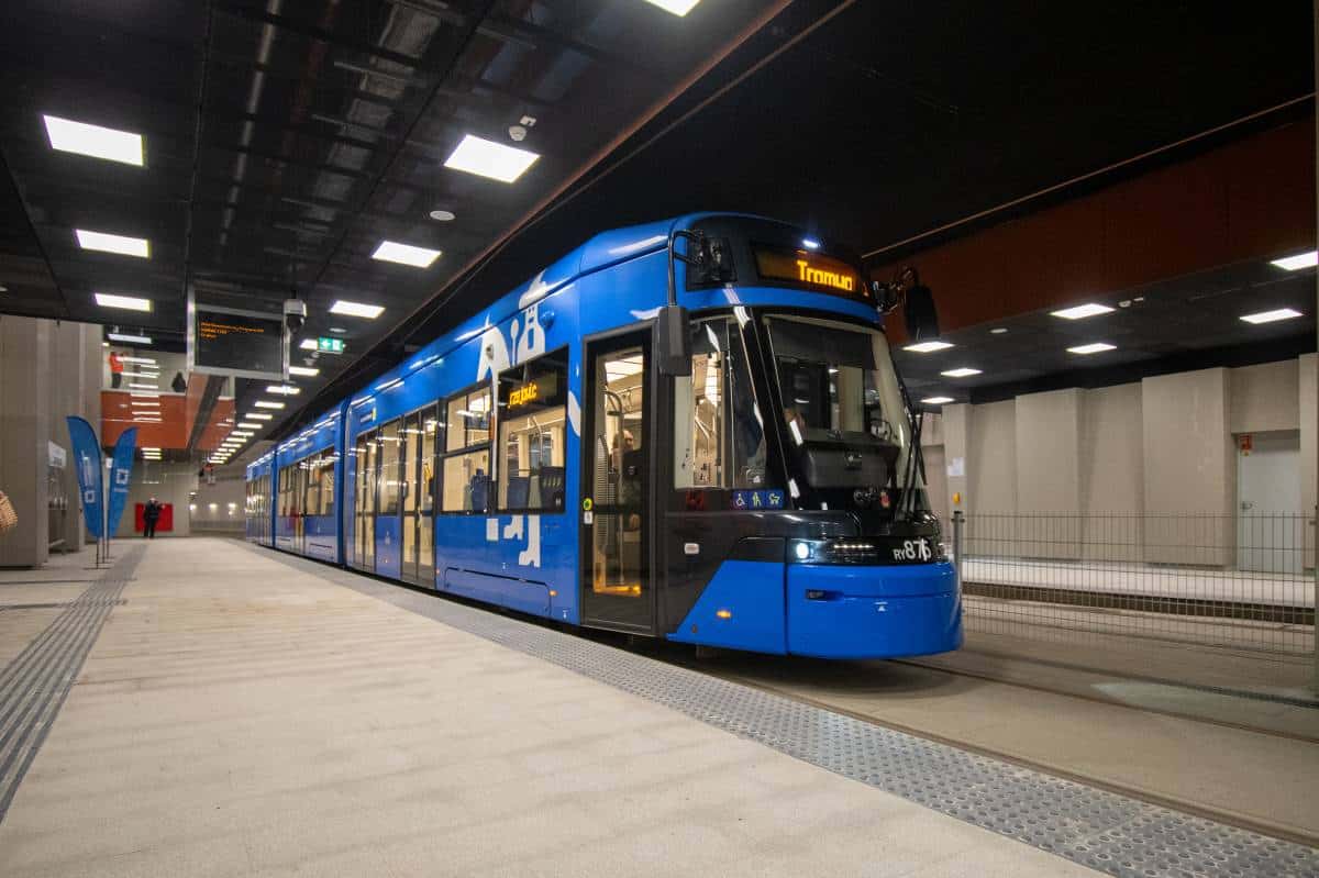 Modern blue mpk krak&oacute;w tram at a new underground station on poland&rsquo;s 4. 5 km fast tram extension to mistrzejowice.